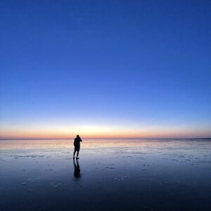 Wattwanderung mit Nationalpark-Wattführer Matthias Hansen im Sonnenaufgang